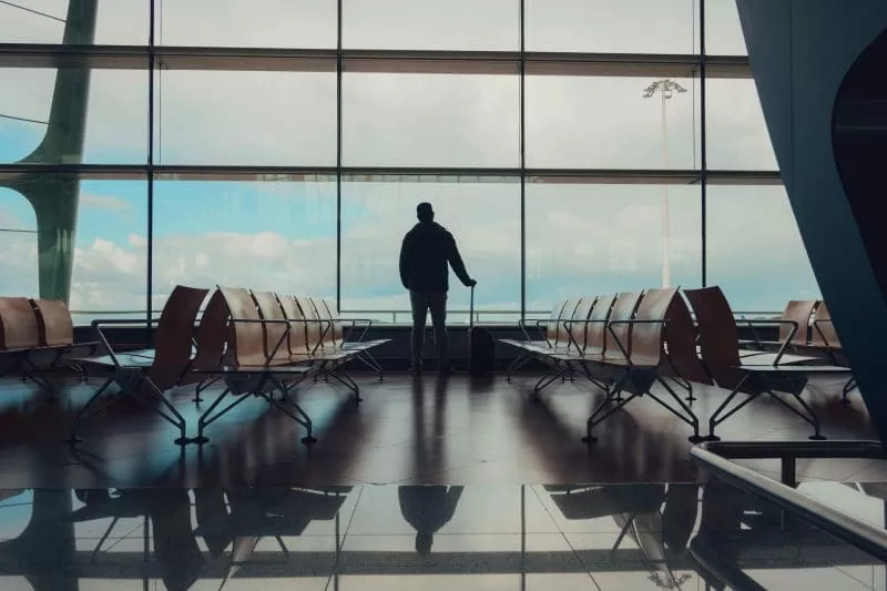 Man waiting in airport terminal