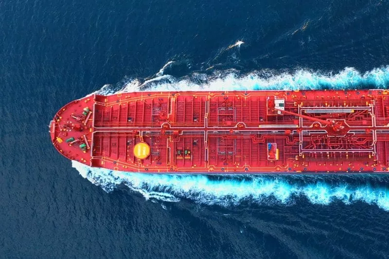 Overhead shot of cargo ship in water