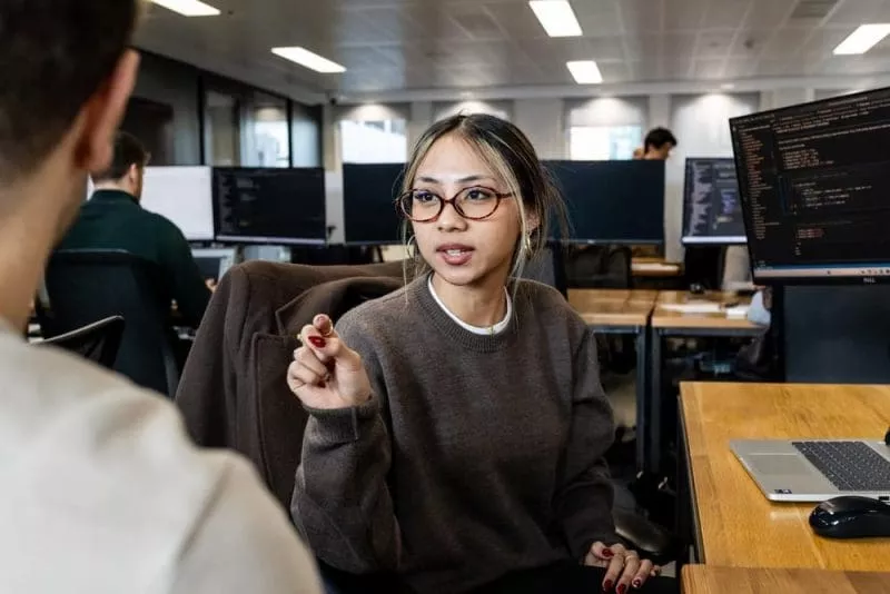 Woman at desk during training